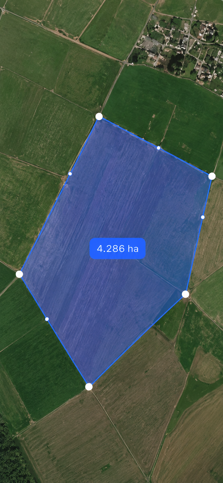 Satellite map view of a measured field with a 4.286 hectare boundary